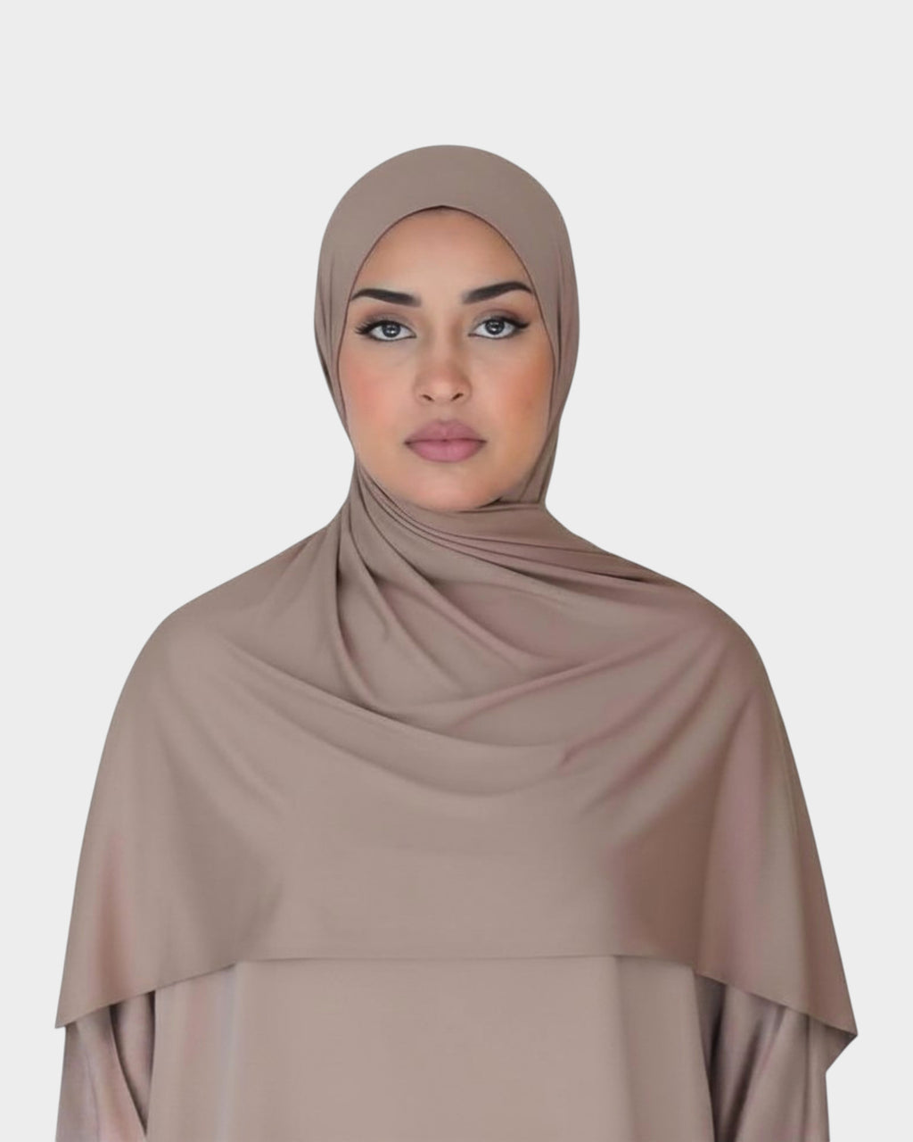 HIJABI LONDON beige premium jersey cotton hijab with 5% Lycra for a soft, stretchy, and breathable fit. Ideal for everyday wear.