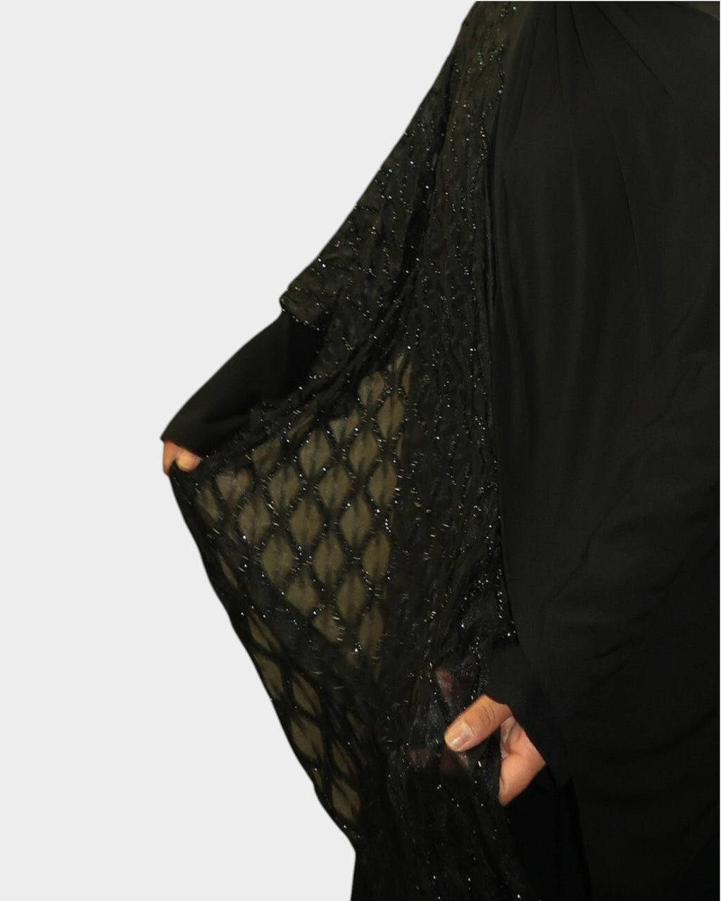 HIJABI LONDON Layali black abaya with beaded floral embroidery on wrap sleeves and a matching chiffon hijab.