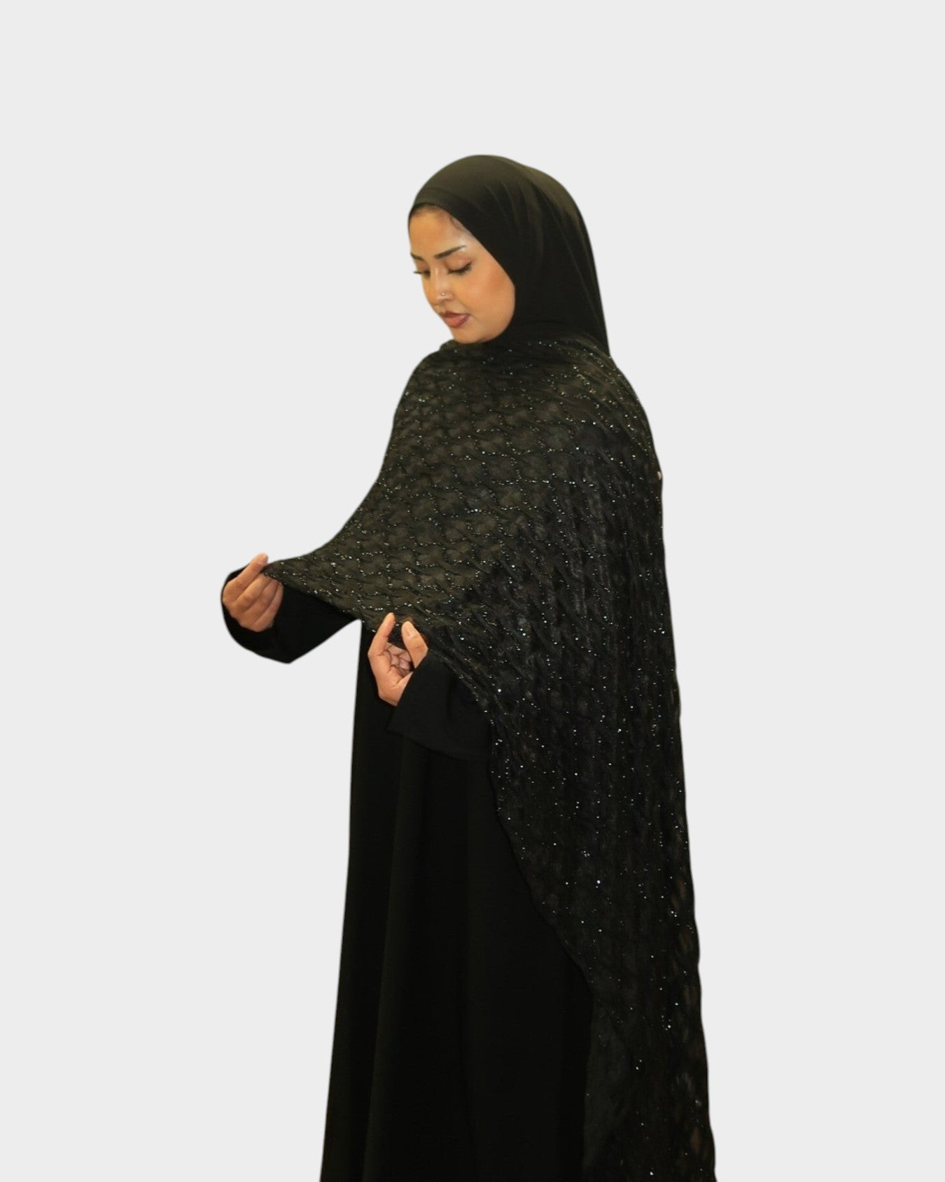 HIJABI LONDON Layali black abaya with beaded floral embroidered wrap sleeves and matching hijab.