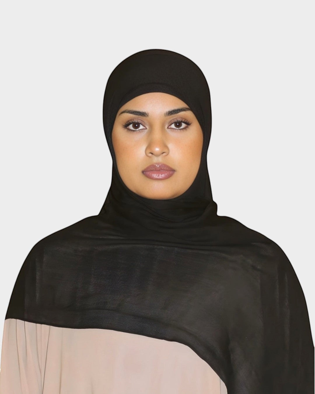 HIJABI LONDON black modal hijab with a soft, draped finish. A versatile essential for everyday or formal wear.