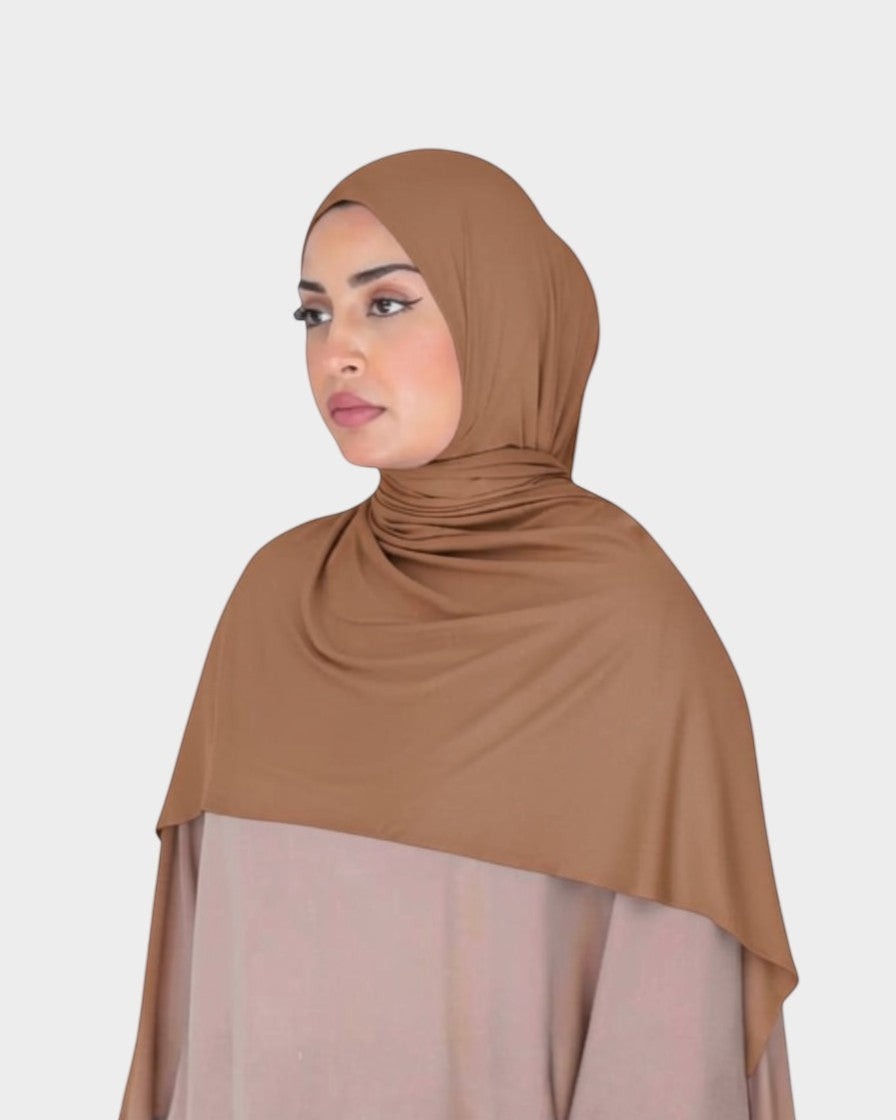 HIJABI LONDON brown premium jersey cotton hijab with a slight stretch for easy styling. Soft, breathable, and comfortable for everyday wear.
