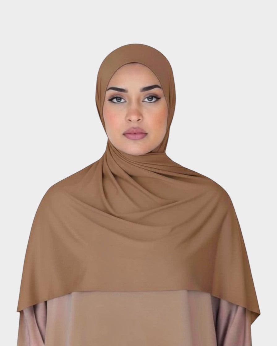 HIJABI LONDON brown premium jersey cotton hijab with a slight stretch for easy styling. Soft, breathable, and comfortable for everyday wear.