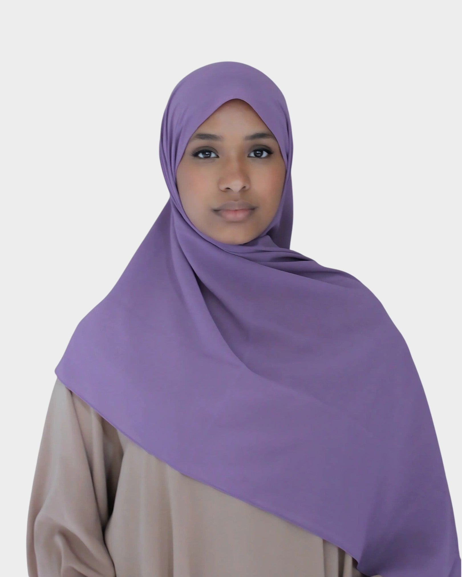 HIJABI LONDON lilac chiffon hijab worn by a woman. Lightweight, breathable, and elegant.