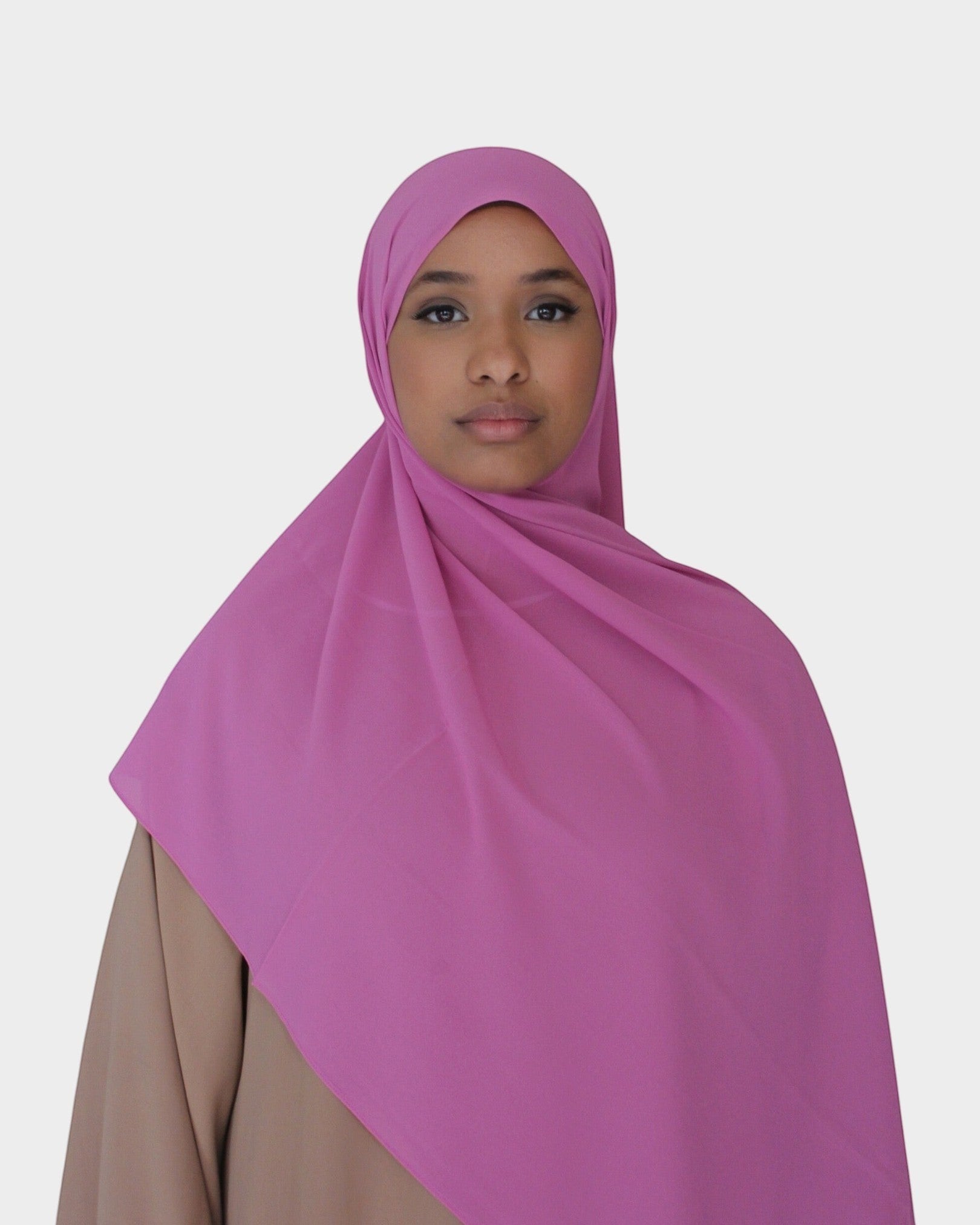HIJABI LONDON magenta ripple chiffon hijab with a textured finish, worn by a model.
