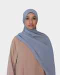 HIJABI LONDON medium grey chiffon hijab draped elegantly over a model wearing a tan abaya. Lightweight and breathable fabric.