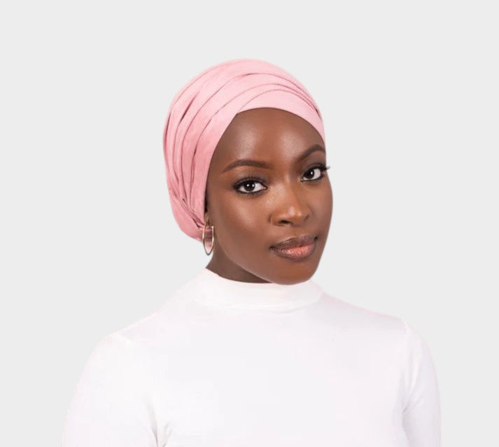 HIJABI LONDON pink faux suede turban wrap with a non-slip finish, one size fits all, no pins needed.
