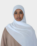 HIJABI LONDON Snow White Chiffon Hijab. Lightweight, breathable, and elegant white chiffon hijab with a textured finish for versatile styling.
