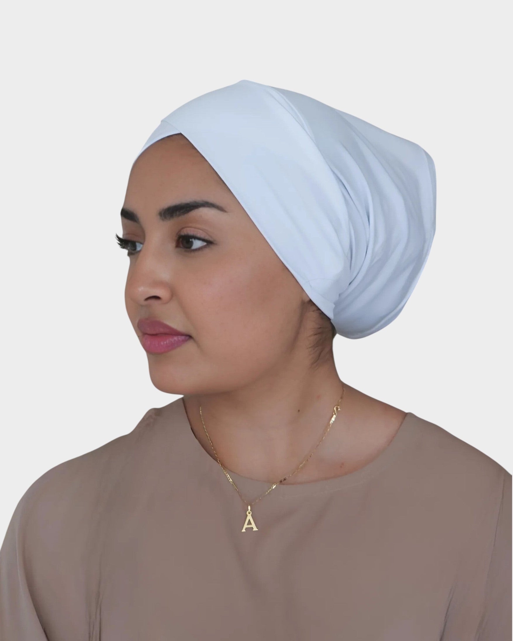 HIJABI LONDON white criss cross cotton undercap hijab for women. Soft, breathable, and stretchy for all-day comfort.
